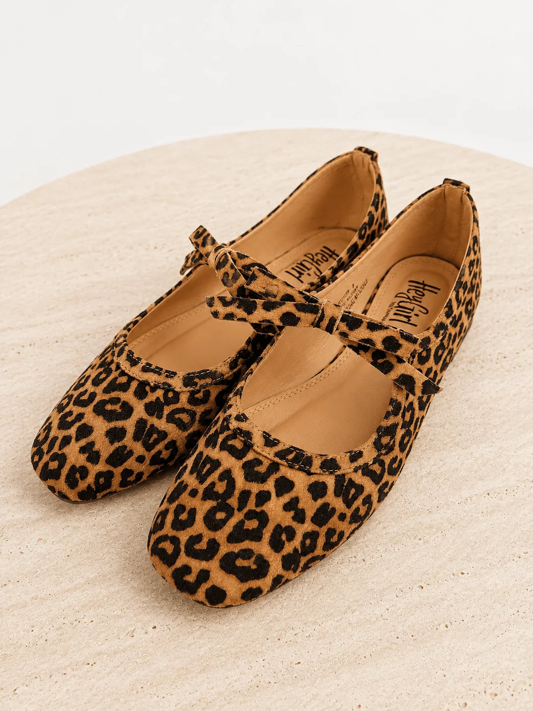 Leopard print Layover Flat Mary Jane flats with decorative bow. Available in multiple sizes.