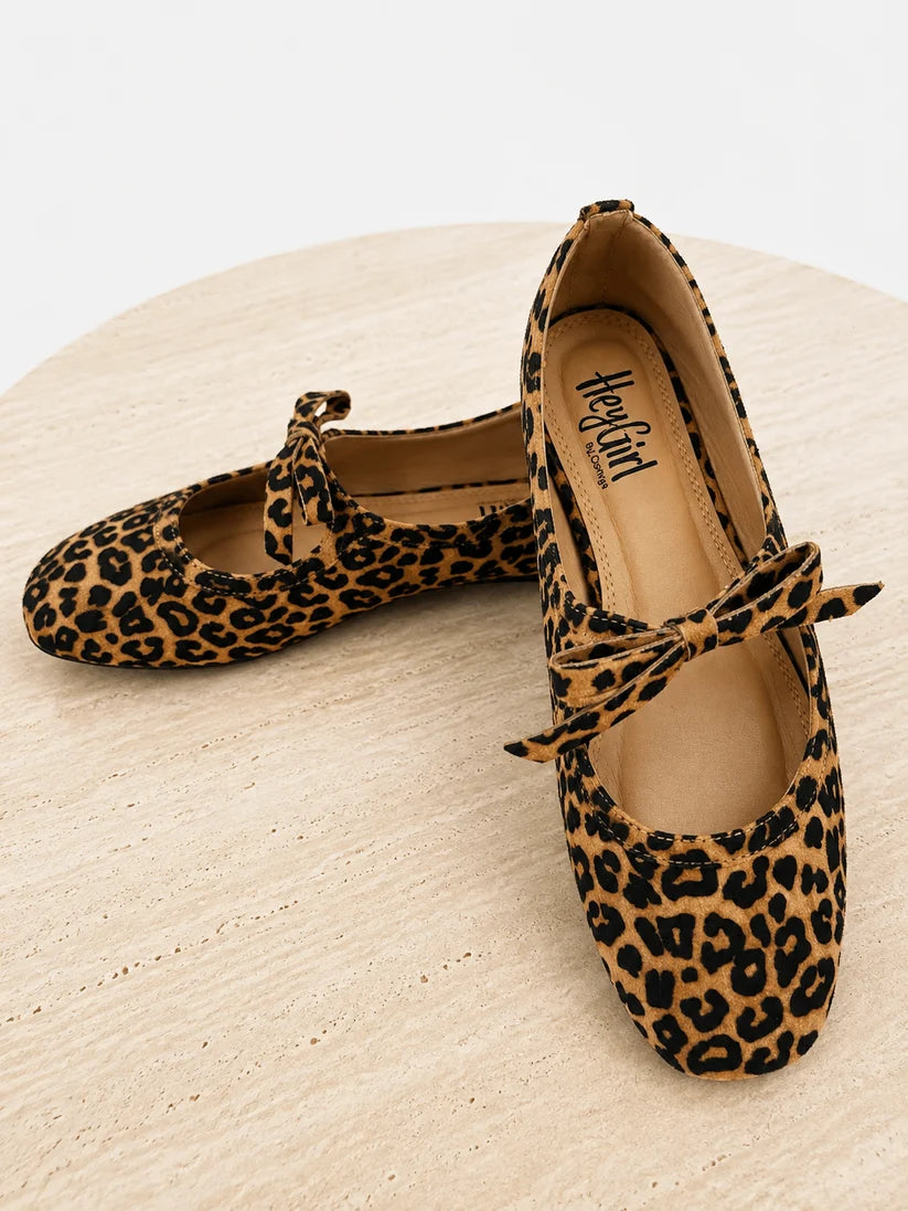 Leopard print Layover Flat With Bow ballet flats featuring a small vamp bow and cushioned footbed. Available in multiple sizes.