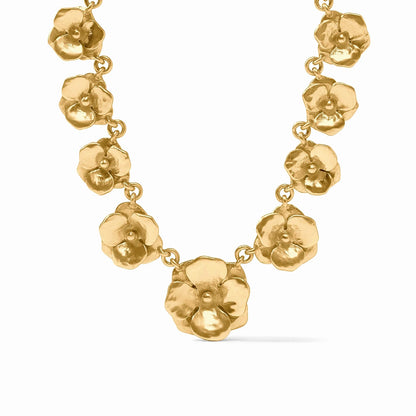 Gold chain necklace with sculpted flower charms, larger center flower, adjustable length. Available in 16", 18", and 20".