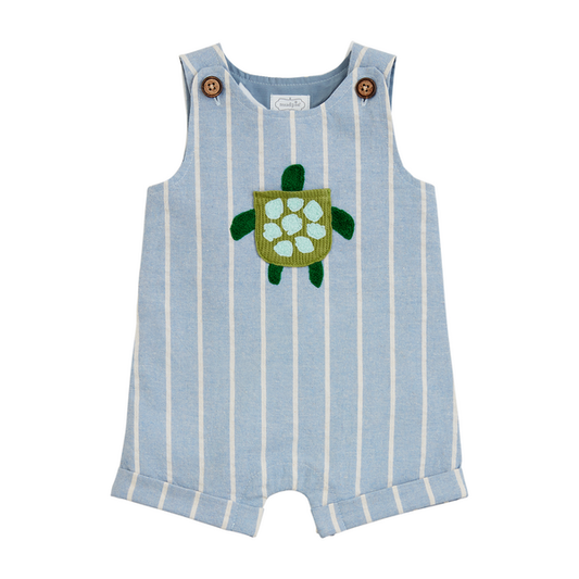 A striped blue and white cotton rayon blend Turtle Pocket Jon Jon with a green turtle applique on the front and two brown buttons at the shoulders, displayed against a white background.