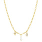 18K Gold Plated Charms Necklace featuring three individual pendants: a heart, a teardrop crystal, and an emerald square gem. Available in one standard size.