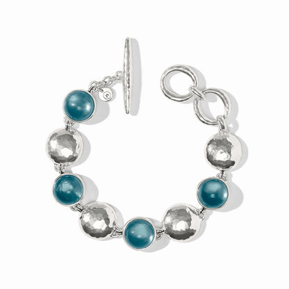 Silver links and blue-green iridescent stones, toggle clasp, two rings for resizing. Available sizes: S/M, M/L.
