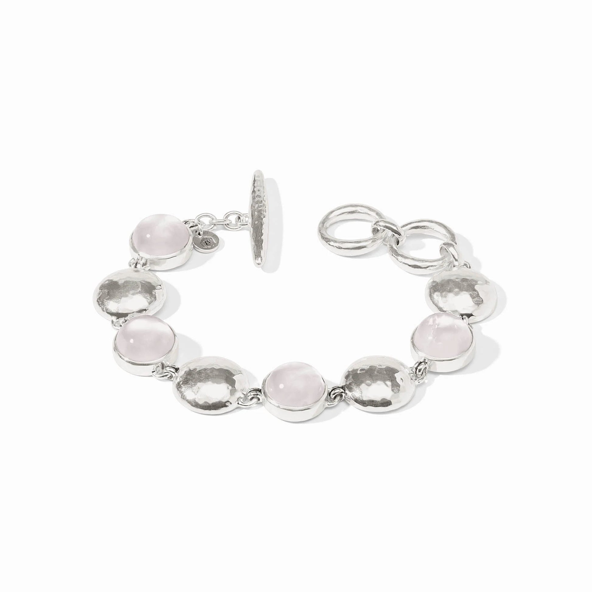 Silver bracelet with rose quartz, iridescent stones, hammered discs, toggle clasp. Available in S, M, L.
