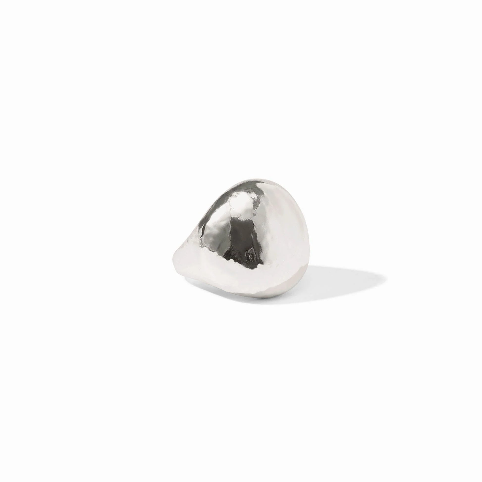 The Solara Ring Silver: small, smooth organic silver form with starburst engraving. Available in sizes 5-9.
