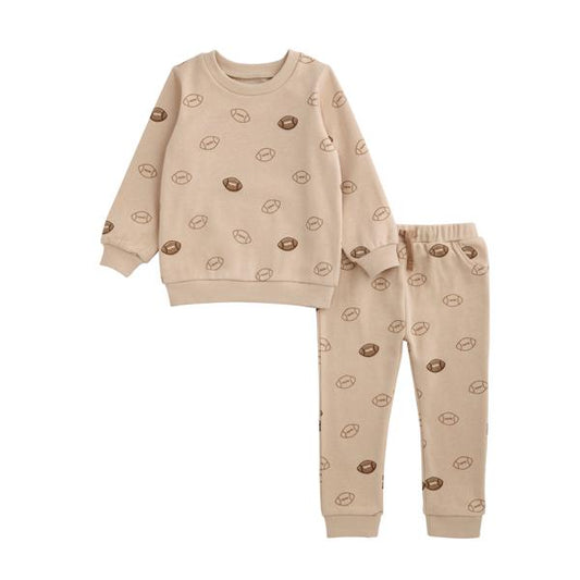 Beige toddler two-piece with brown football prints, ribbed cuffs, elastic waist. Sizes: 12M-4T.