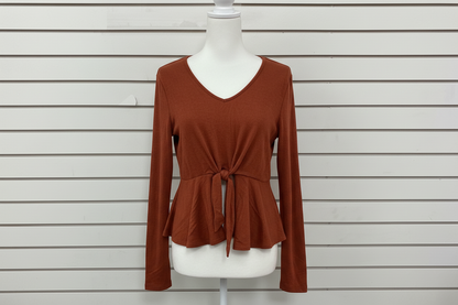 Burnt Orange Long Sleeve Tied Waist top by White Birch with v-neckline and front tie. Available in sizes S-XL.
