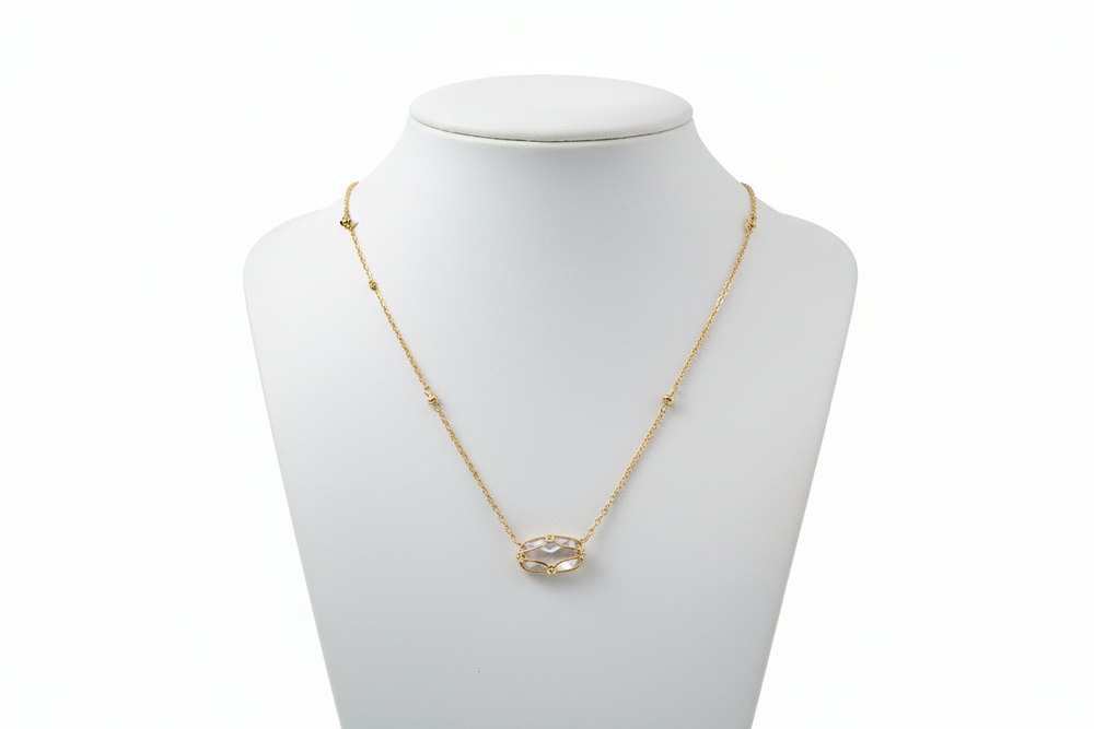 Elisa Lattice Gold Frame necklace by Kendra Scott with a delicate gold chain and open circular pendant. Sizes: 16", 18", 20".