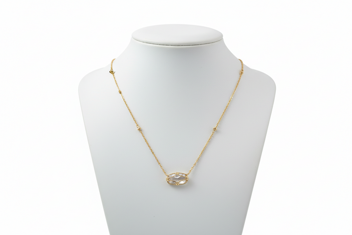 Elisa Lattice Gold Frame necklace by Kendra Scott with a delicate gold chain and open circular pendant. Sizes: 16", 18", 20".