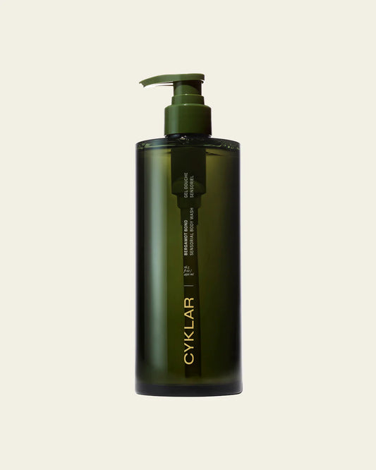 Dark green "Bergamot Bond Body Wash | Cyklar" bottle with minimalist white and gold text. Available in 250ml and 500ml sizes.