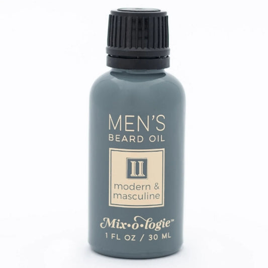 Mix O Logie Men’s Beard Oil in a gray 1 fl oz (30 ml) bottle with black cap and cream label.