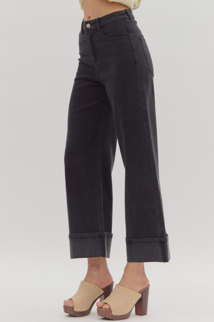 Black Wide Hem Denim Pants in lightweight denim with large cuffs. Available sizes: XS, S, M, L, XL.