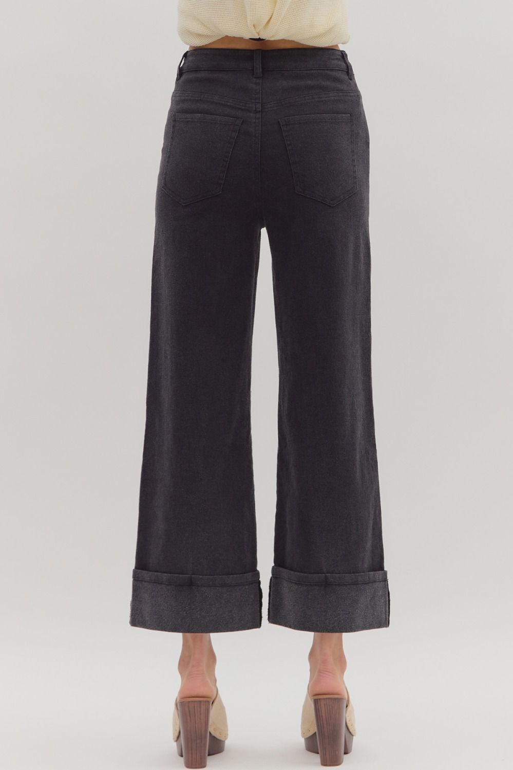 Black Wide Hem Denim Pants with oversized cuffs; available in sizes S, M, L, XL.