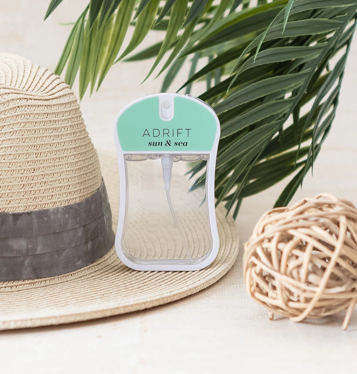 Adrift Sun and Sea Moisturizing Body Mist | Mix O Logie with mint green cap, available in 3.4oz and 1oz sizes.