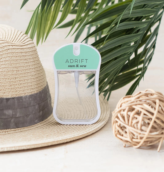 Adrift Sun and Sea Moisturizing Body Mist | Mix O Logie with mint green cap, available in 3.4oz and 1oz sizes.