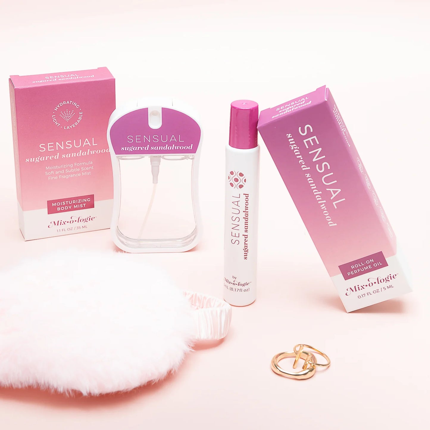 Mix O Logie's Inspired Perfume Oil Roll On and body mist, available in multiple sizes, displayed with product packaging.