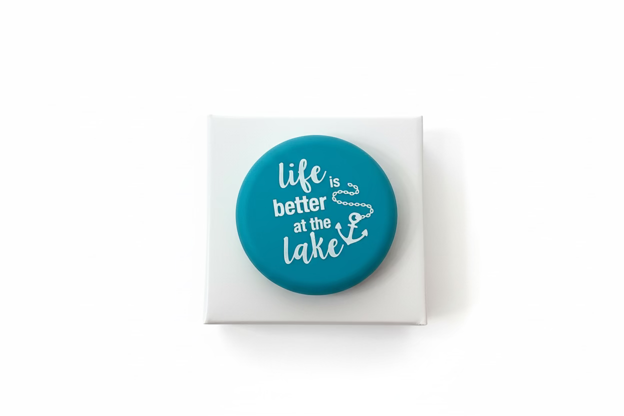 Round teal Wine Cap with “life is better at the lake” in white and a small anchor. Sizes available.