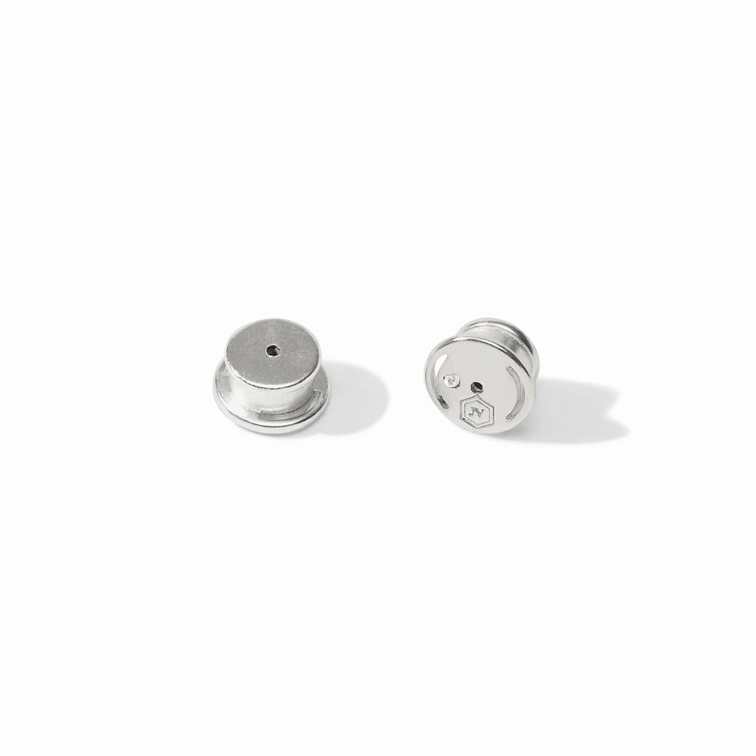 Two small, round earring backs for Bloom Hoop Silver; one flat top, one with locking mechanism. Available in multiple sizes.