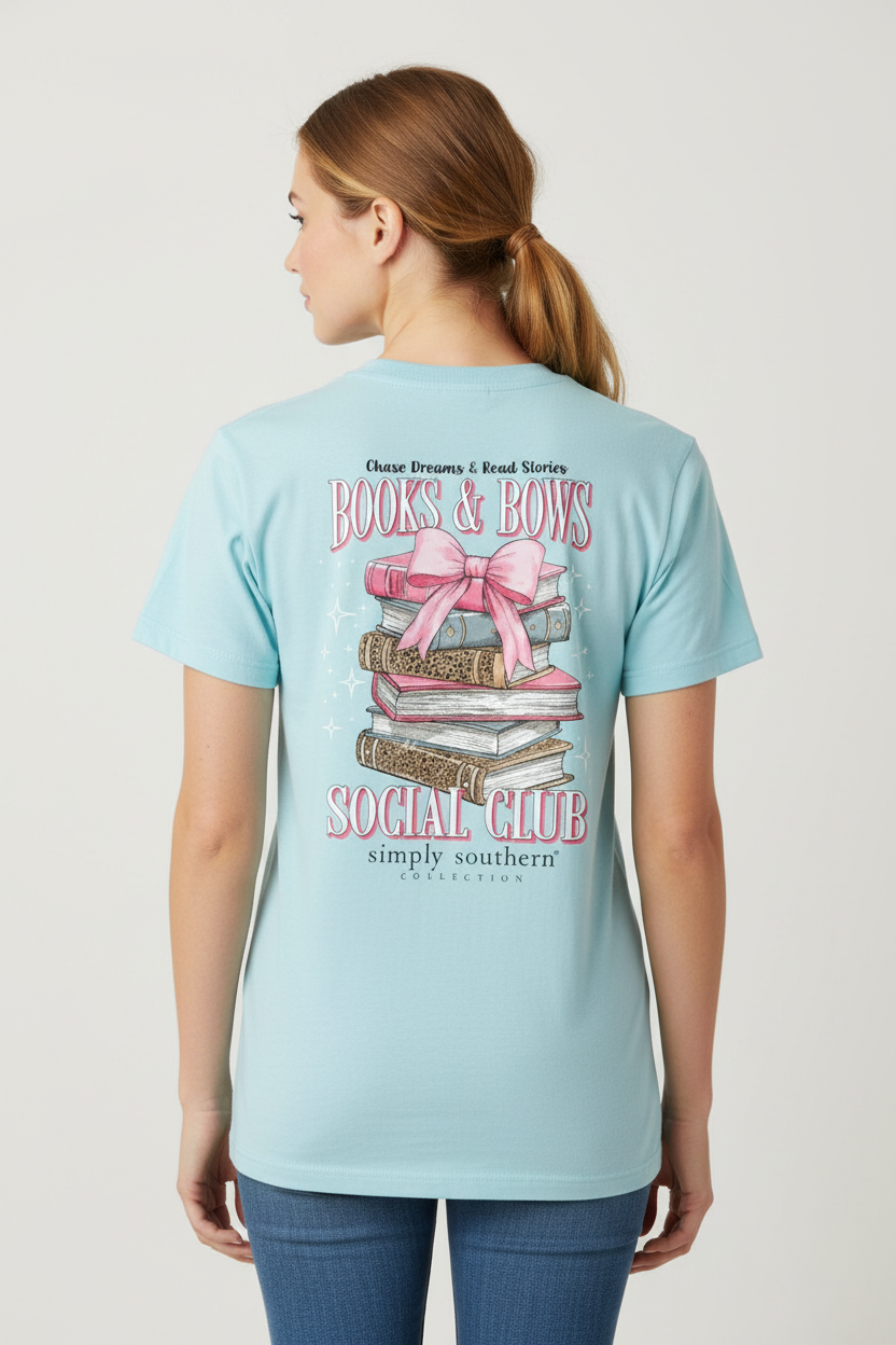 Aqua Books and Bows T-Shirt with stacked books, pink bows, and "Books & Bows Social Club" text; sizes S-XXL available.