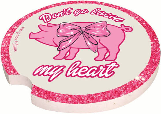 Round, water-absorbent car coasters with glittery pink edges, pig with bow, and "Don't go bacon my heart" text. Sizes: standard.