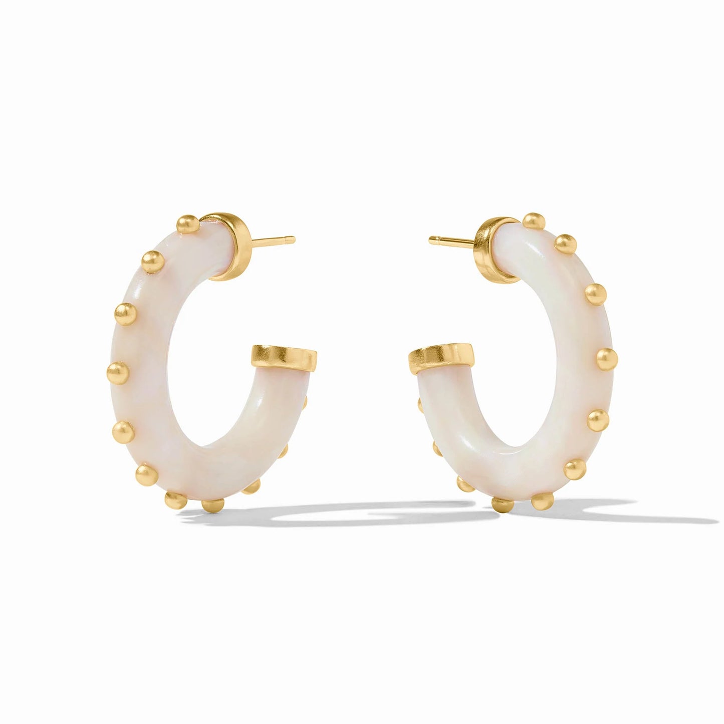 Chunky, curved white acetate hoops with 24K gold plated ball accents. Available in medium size.