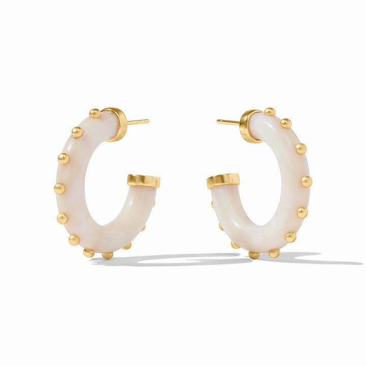 Chunky, curved white acetate hoops with 24K gold plated ball accents. Available in medium size.