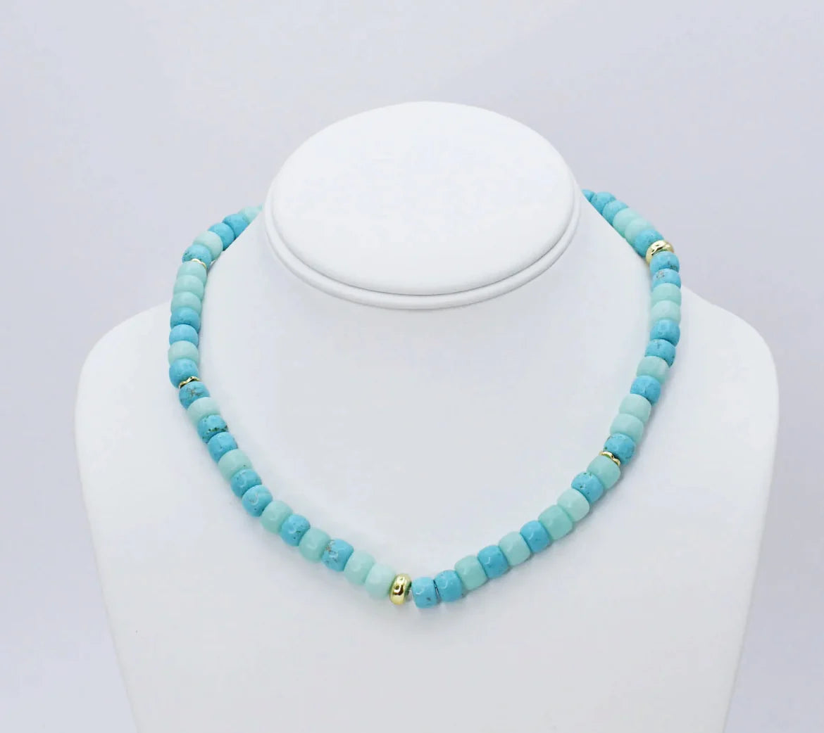 The Ocean Girly Necklace: 16-inch strand with turquoise, light blue, and small gold beads. Available in 16-inch size only.