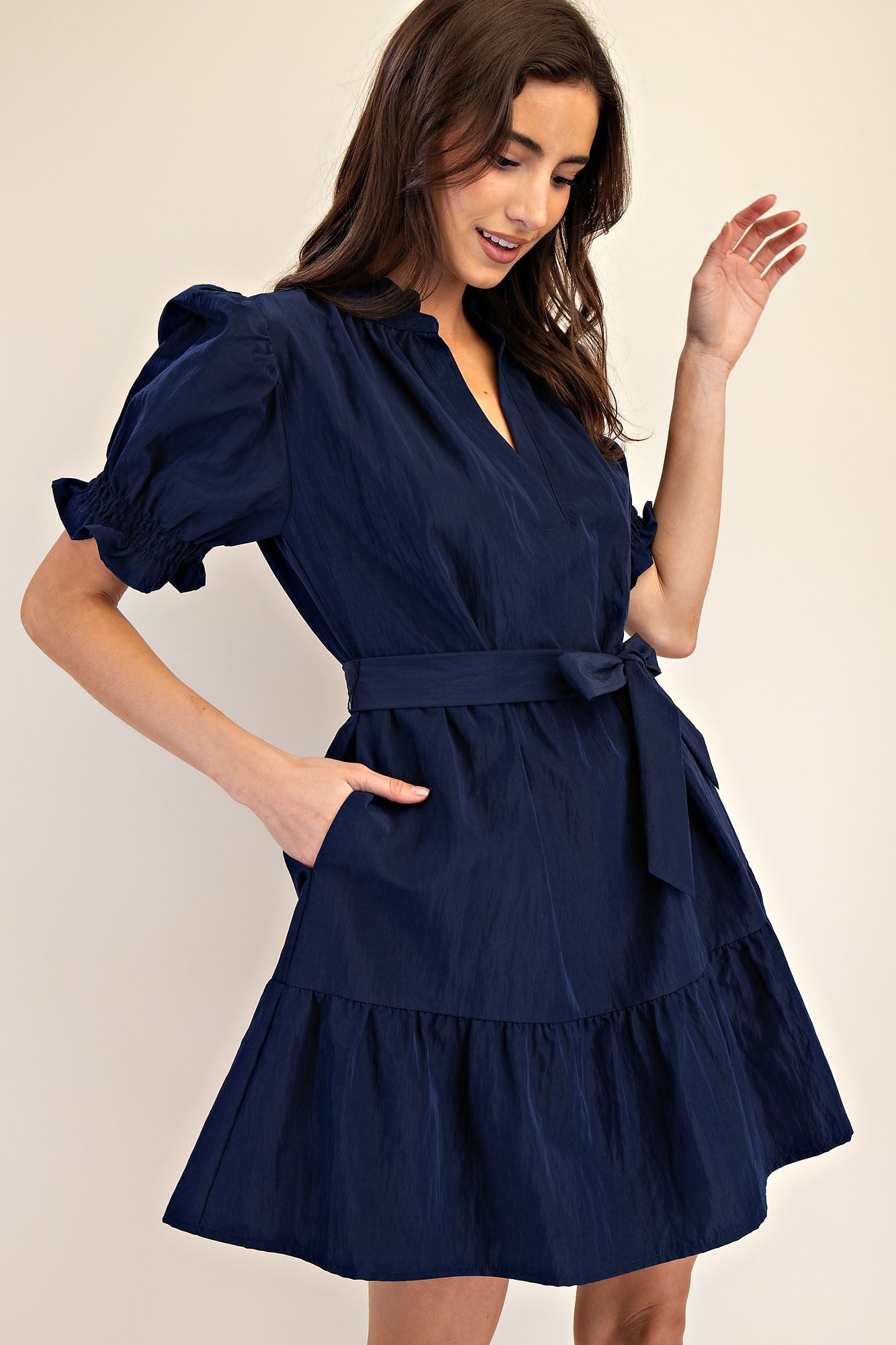 Mavis Navy Ruffle Neck Dress with short sleeves and belted waist. Available in sizes XS-XL.