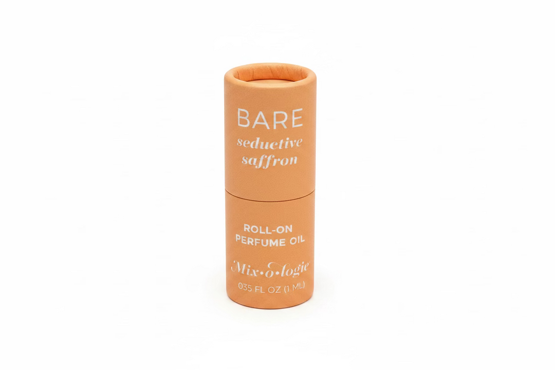 Peach-colored cylindrical "Keychain Mini Rollerball Perfume" container. Available sizes: 5ml, 10ml.