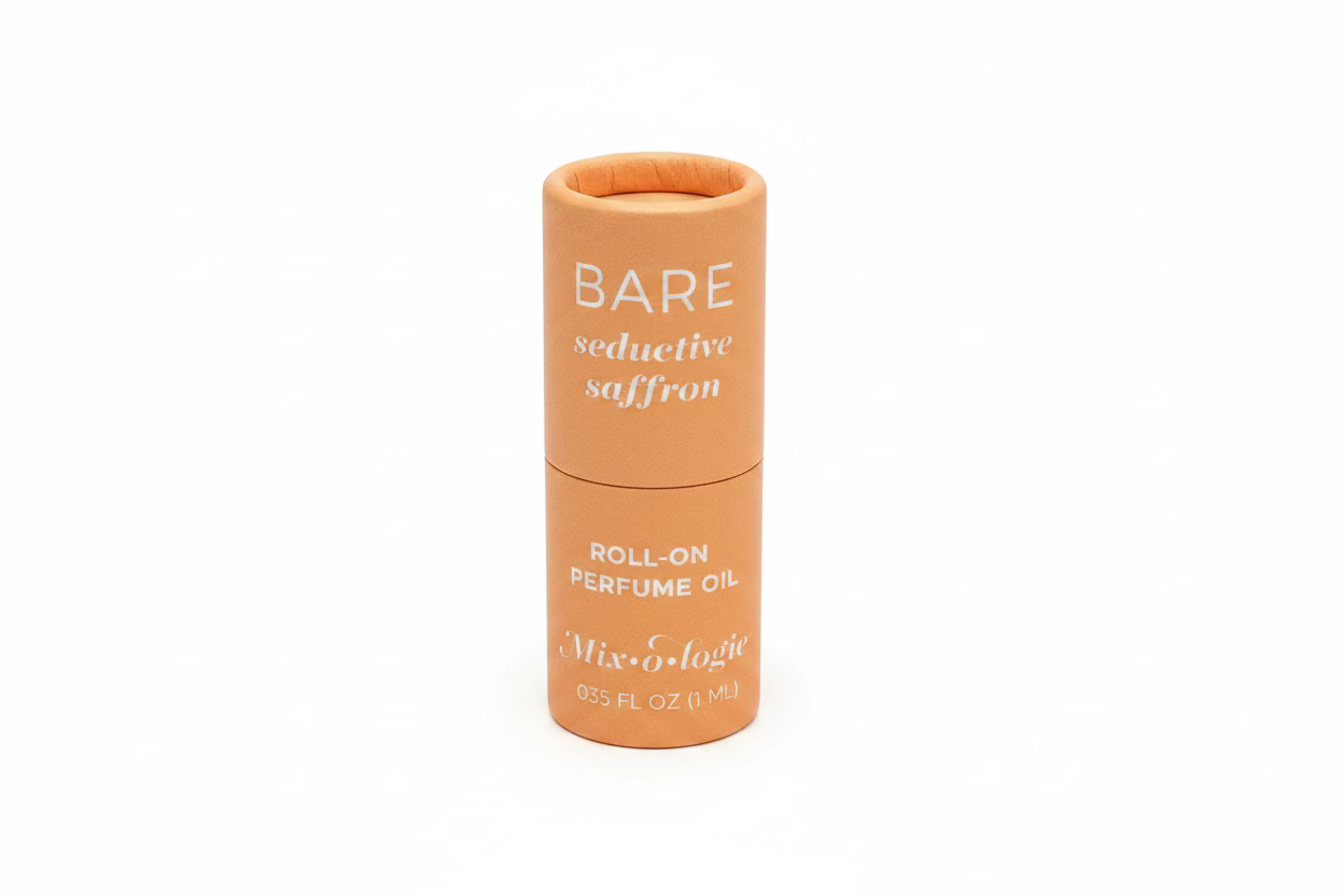 Peach-colored cylindrical "Keychain Mini Rollerball Perfume" container. Available sizes: 5ml, 10ml.