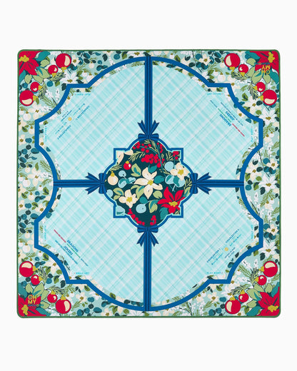 Square scarf with a blue plaid center, bordered by red, white, and green floral patterns, apples, white flowers, and green leaves. Blue lines divide the design into four sections. Available sizes: [not specified].