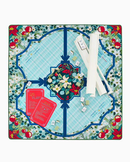 The Winterberry Mat in Tube features vibrant floral and fruit patterns. Available sizes: standard and large.