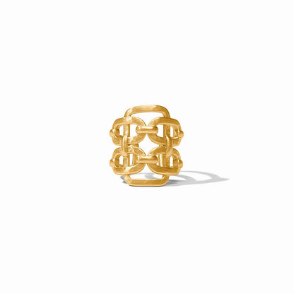 The Sahara Statement Ring is a wide gold band with an openwork geometric design, available in sizes 6-9.