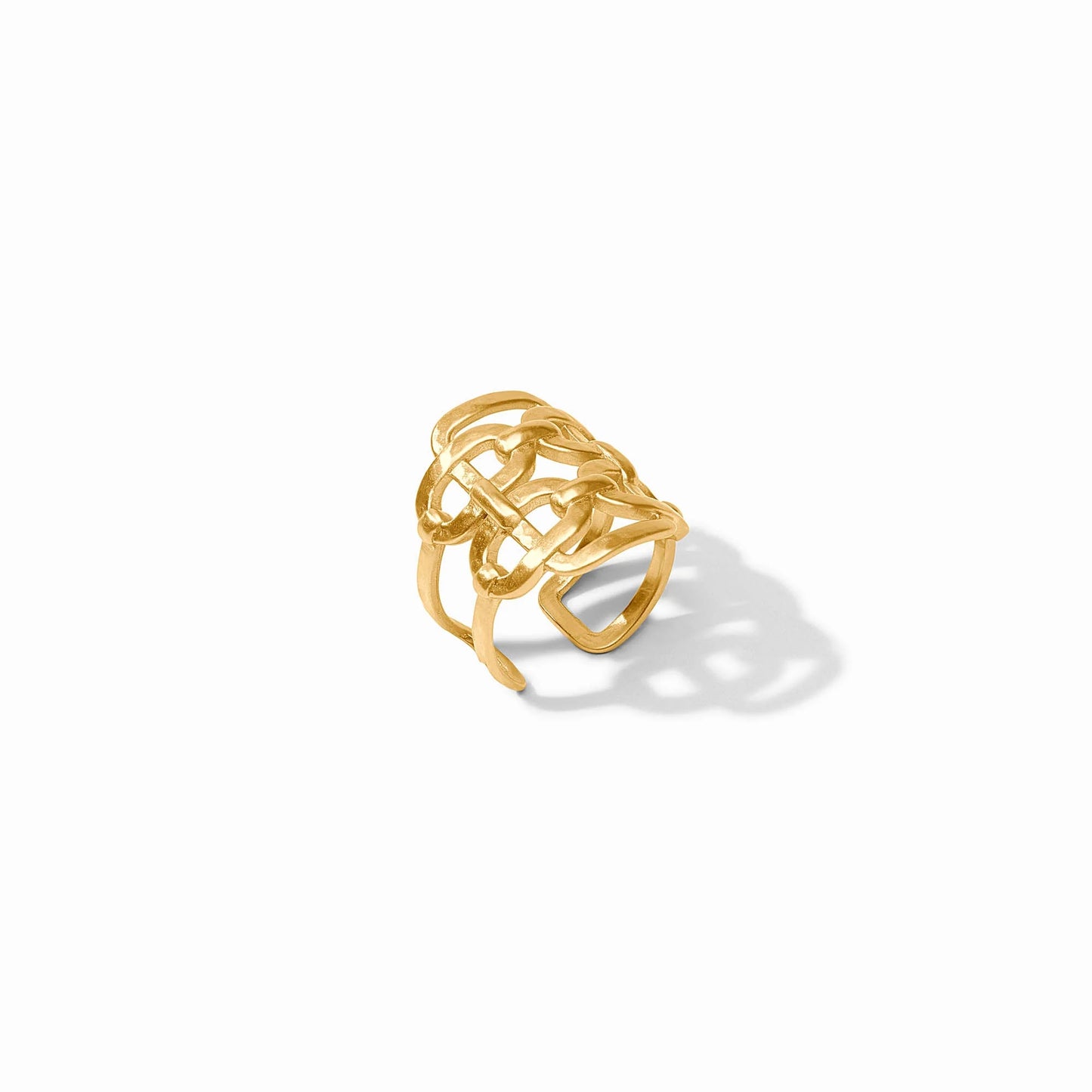 The Sahara Statement Ring features an open, abstract woven design with a radiant gold finish. Available in sizes 6, 7, and 8.