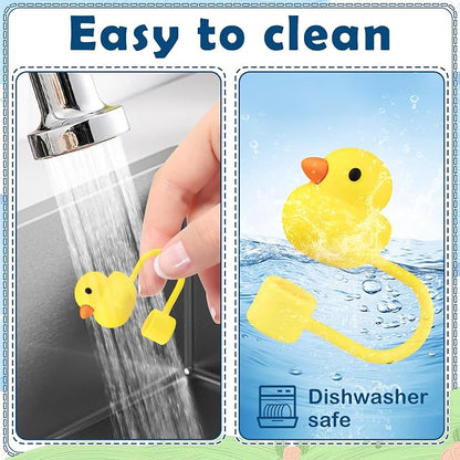 Yellow silicone Duckies Straw Topper shaped like a duck, shown being rinsed with water. Text reads “Easy to clean” and “Dishwasher safe” next to a dishwasher icon. Available in multiple sizes.