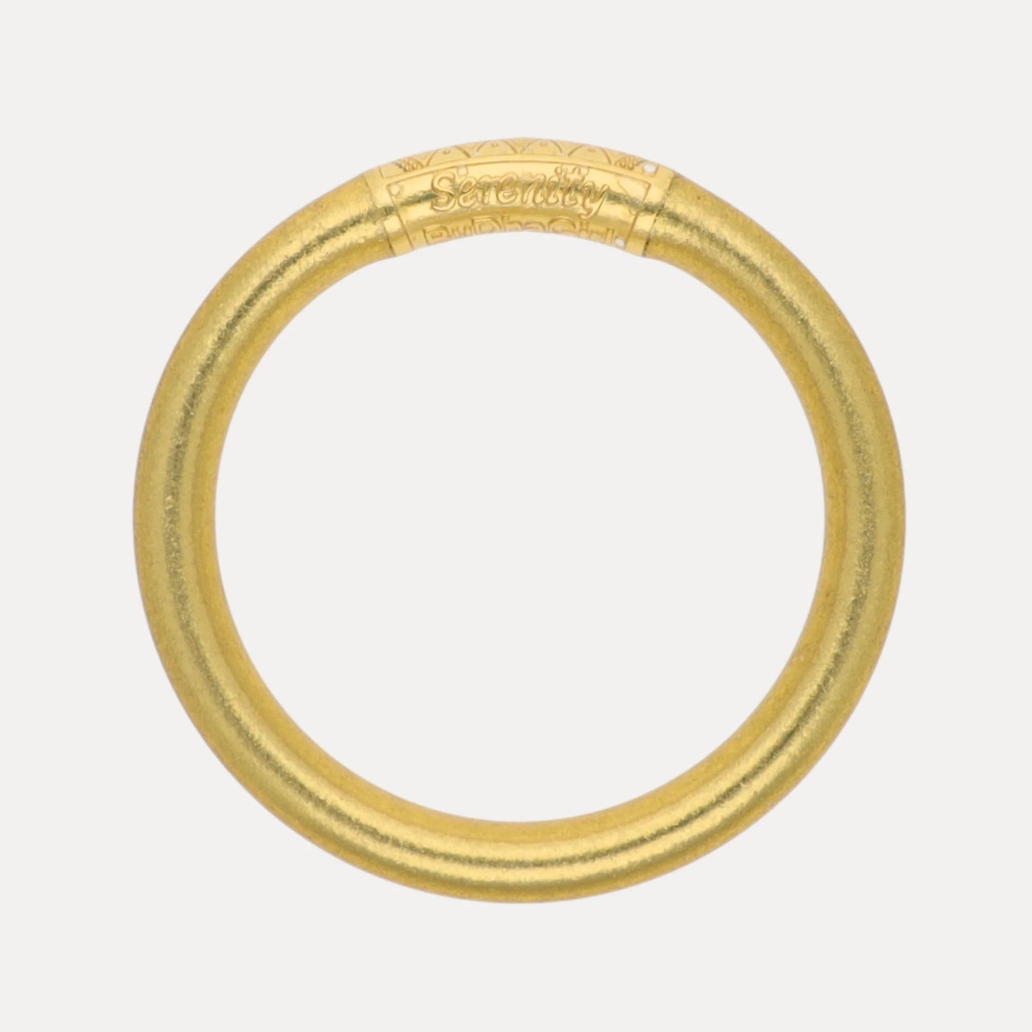 The Aura Tzubble All Weather Bangle - Serenity Prayer, with engraved details and “Serenity” inscribed on top in a handcrafted style. Available in multiple sizes.
