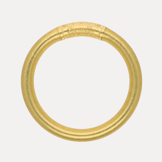 The Aura Tzubble All Weather Bangle - Serenity Prayer, with engraved details and “Serenity” inscribed on top in a handcrafted style. Available in multiple sizes.