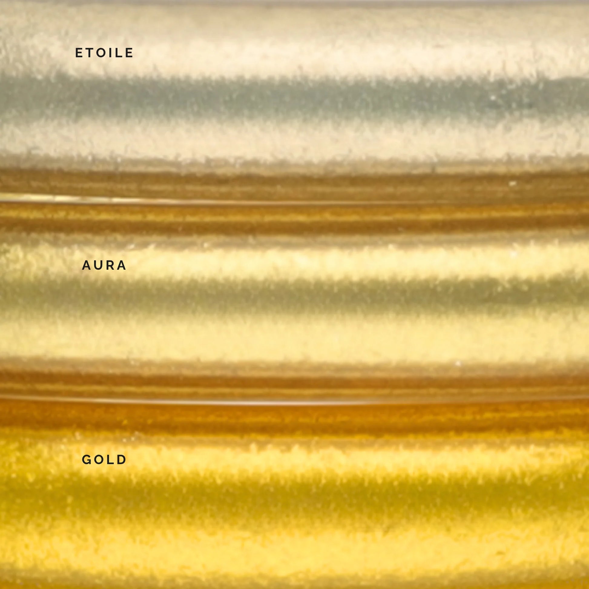 Three metallic color bands—Etoile (silver), Aura (light gold), and Gold (deep gold)—with a shimmering, textured finish. Available in sizes S, M, L.