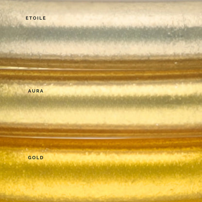 Three metallic color bands—Etoile (silver), Aura (light gold), and Gold (deep gold)—with a shimmering, textured finish. Available in sizes S, M, L.