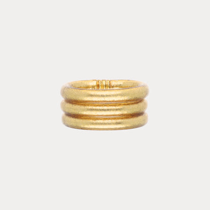 Set of three Aura All Weather Rings, size 7, gold matte finish with evenly spaced horizontal bands.