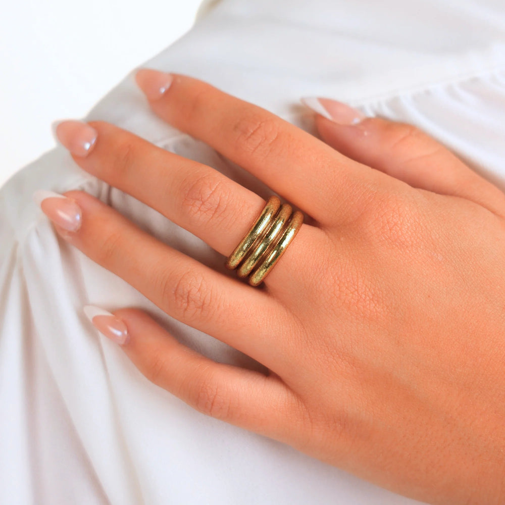 Aura All Weather Rings Set of 3, thick gold waterproof bands; available in sizes including Size 7.