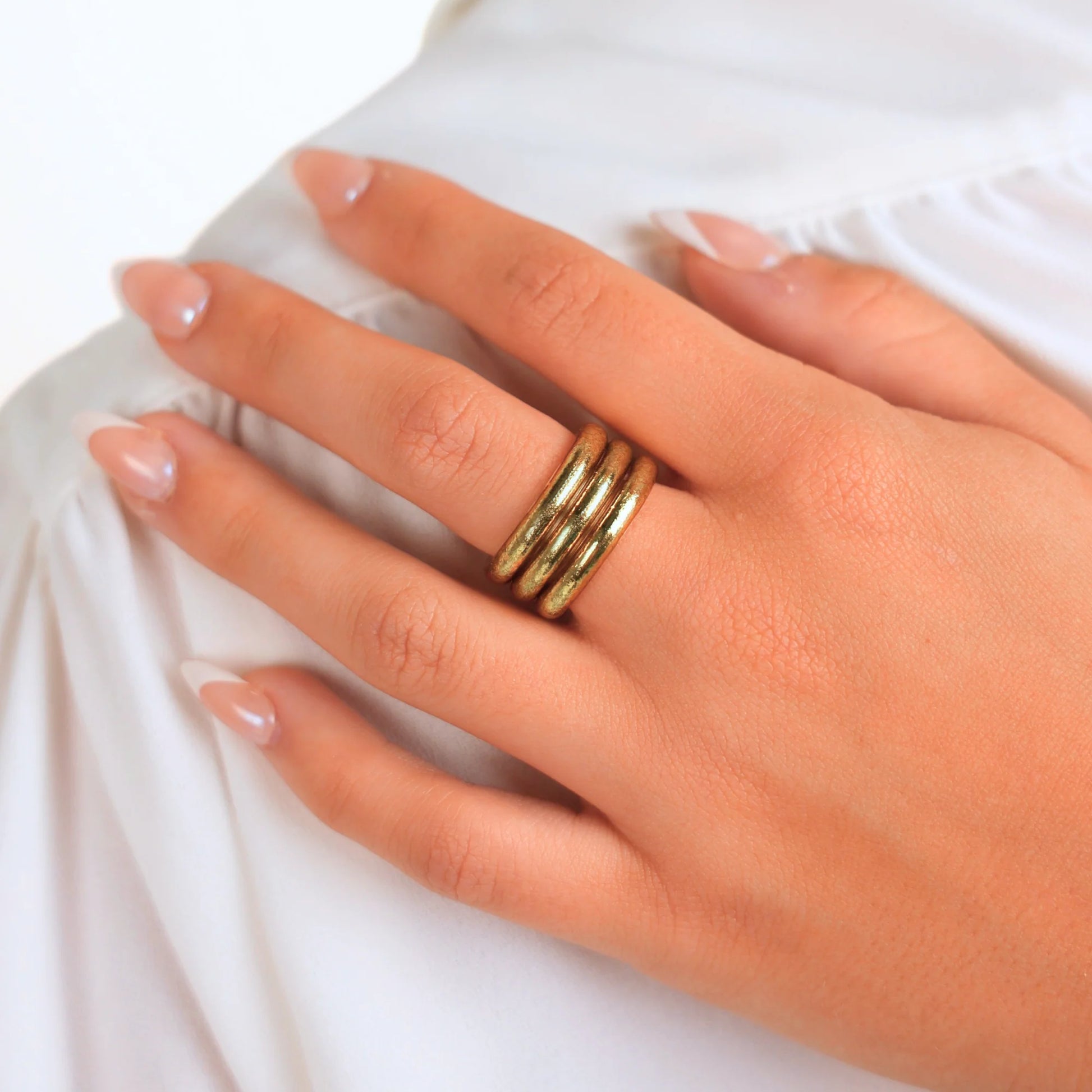 Aura All Weather Rings Set of 3, thick gold waterproof bands; available in sizes including Size 7.