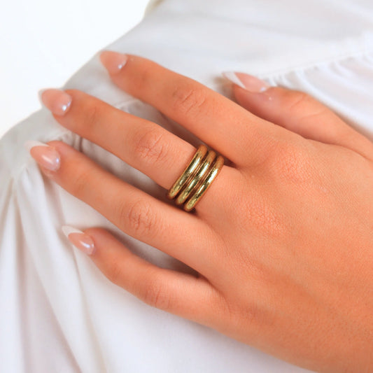 Aura All Weather Rings Set of 3, thick gold waterproof bands; available in sizes including Size 7.