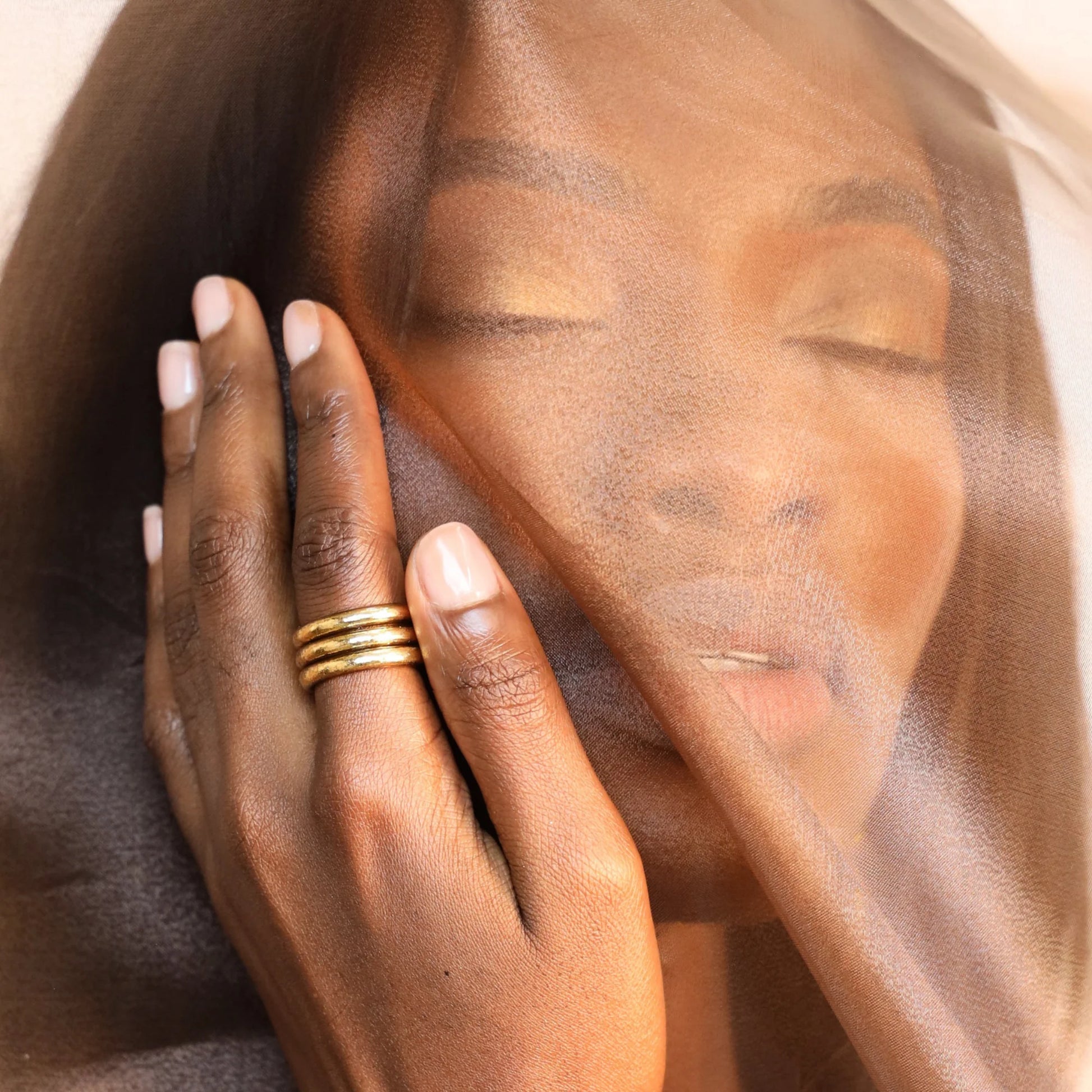 Aura All Weather Rings Set of 3, shown stacked, available in Size 7.
