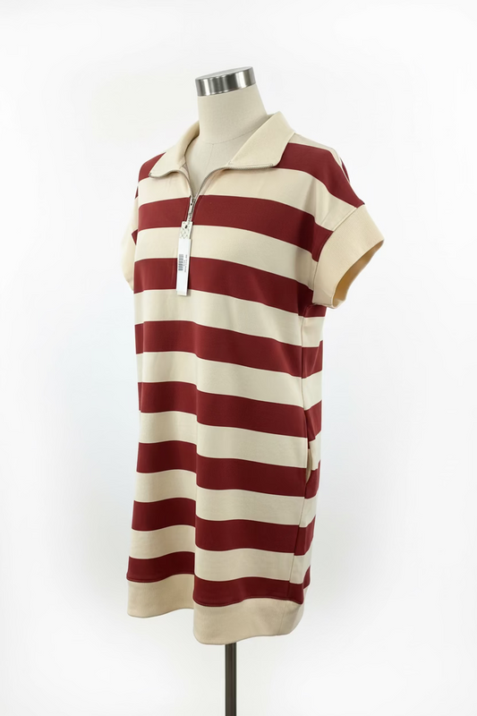 Burnt orange and cream striped dress with quarter-zip neckline, short sleeves. Sizes: XS-XL. Bold red, beige stripes.