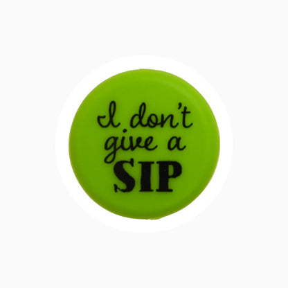 Bright green round Wine Cap with "I don't give a SIP" in black text. Available sizes: standard wine bottle fit.
