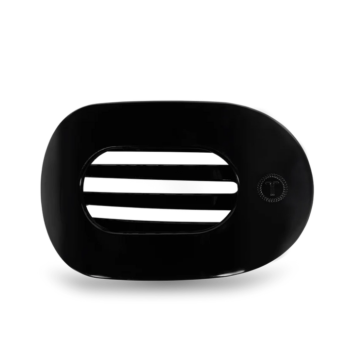 Jet Black TELETIES soap dish with bendable teeth, drainage slats, and small logo; available in small and large sizes.