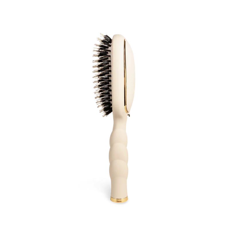 Teleties Hair Brush: cream vented design, black anti-static bristles, gold accents, ribbed handle. Available in multiple sizes.