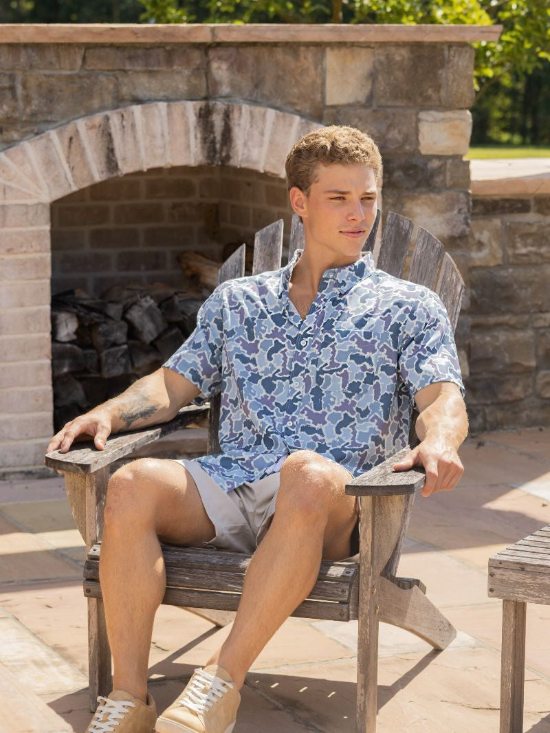 Men’s Blue Camo Polo shown; available in sizes S-XXL.