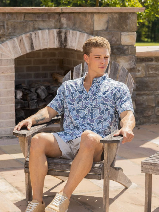 Men’s Blue Camo Polo shown; available in sizes S-XXL.