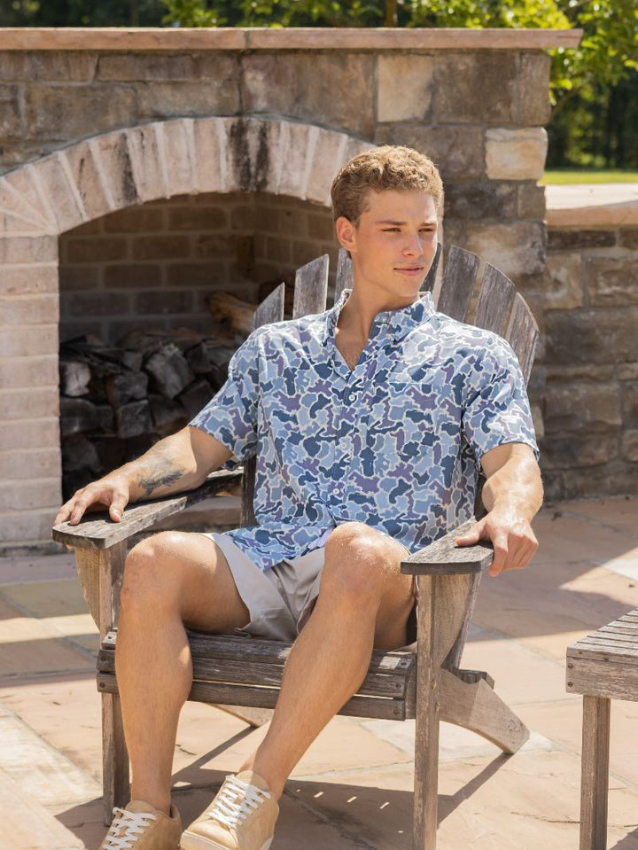 Men’s Blue Camo Polo shown; available in sizes S-XXL.